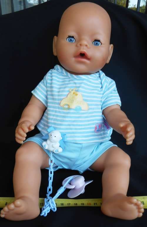 collectable Zapf Interactive Baby Born doll with dummy and rattle