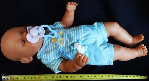 collectable Zapf Interactive Baby Born doll with dummy and rattle
