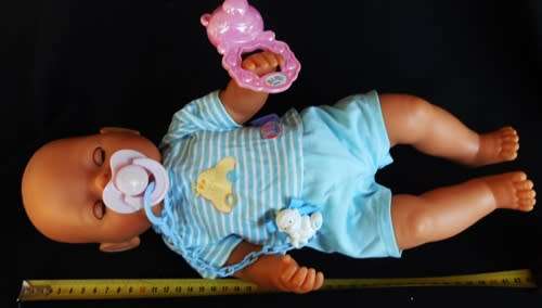 collectable Zapf Interactive Baby Born doll with dummy and rattle