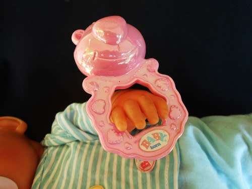 collectable Zapf Interactive Baby Born doll with dummy and rattle