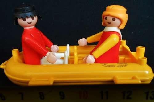 vintage Playmobil dingy with two people