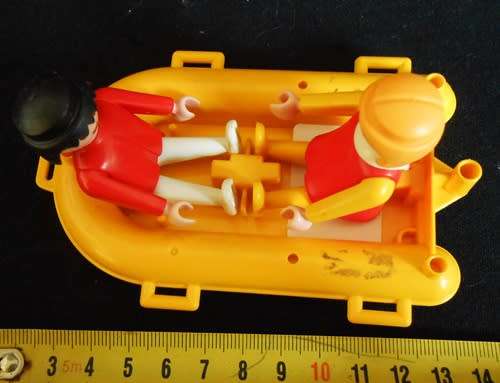 vintage Playmobil dingy with two people