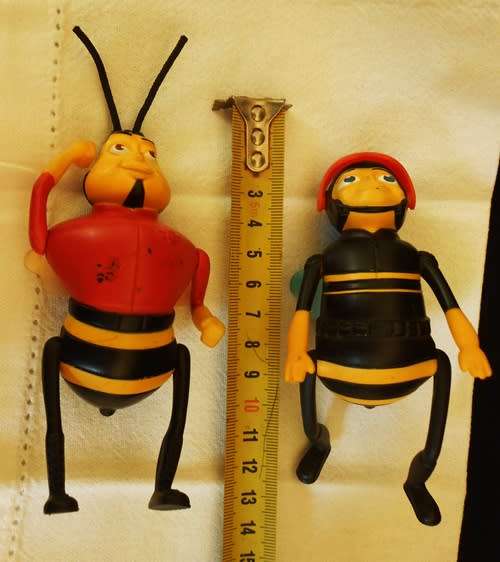 two collectible bee figures from The Bee Movie by Dreamworks