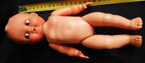 vintage doll hard plastic and rubber with molded hair