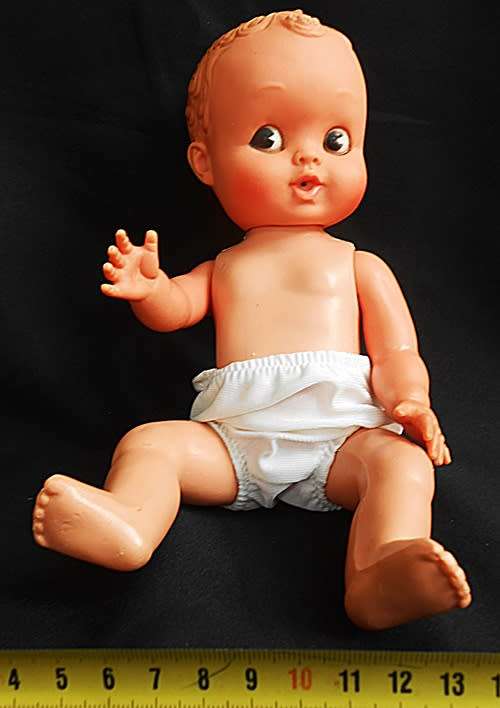 vintage doll hard plastic and rubber with molded hair