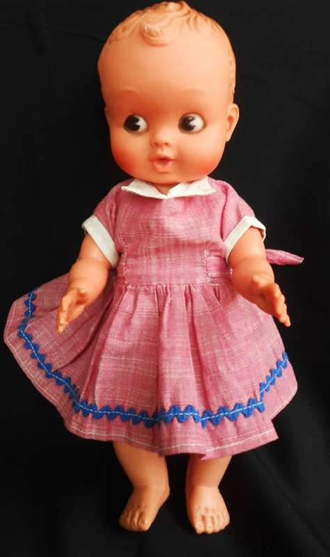 vintage doll hard plastic and rubber with molded hair