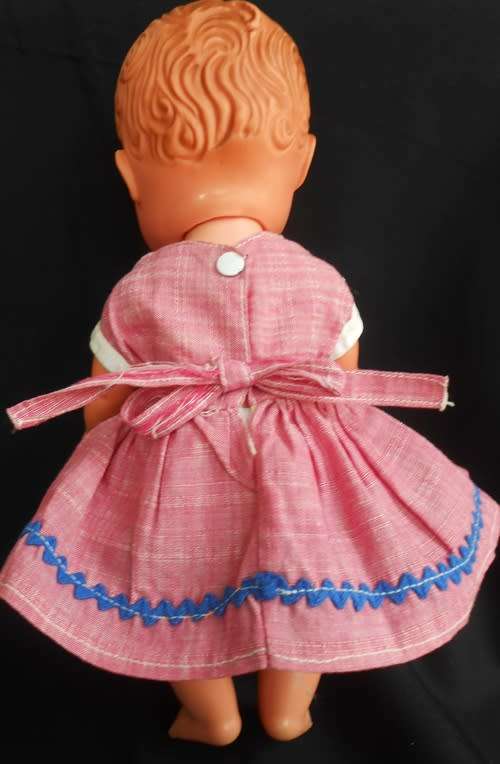 vintage doll hard plastic and rubber with molded hair