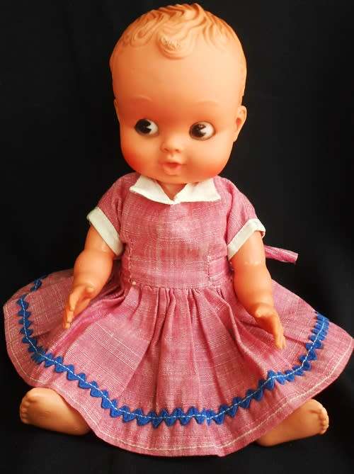 vintage doll hard plastic and rubber with molded hair