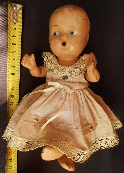 Collectable Vintage small composition doll from 1940 s in pretty dress