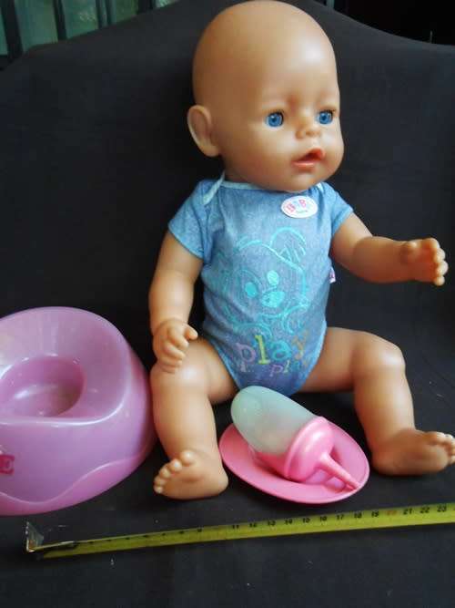 Orignal Baby Born doll with accessories by Zapf Creations