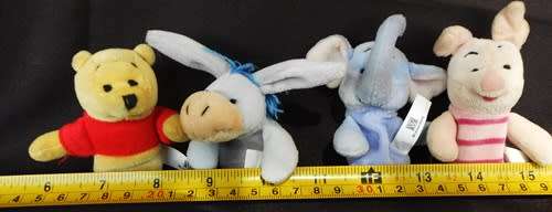 collectable Winnie the Pooh four mini plush finger puppets Disney made for Woolworths