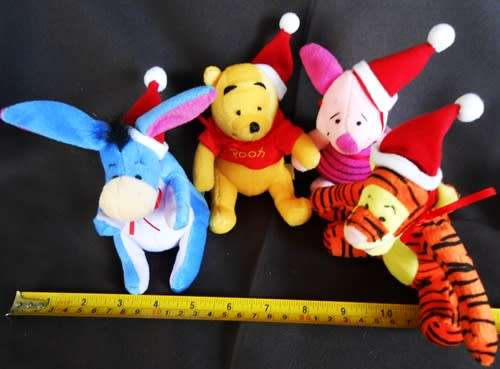 Collectable set of four Winnie the Pooh plush characters in a Christmas mood. made for woolworths
