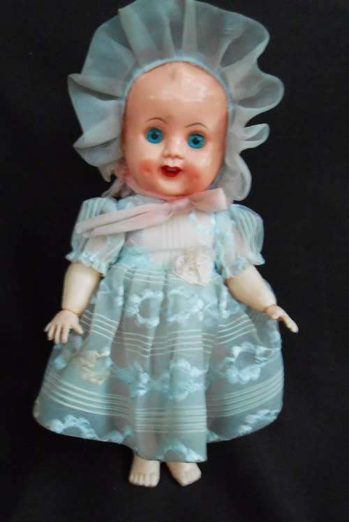 Small Vintage Evergreen Baby Doll - Sleep Eyed Hard Plastic -Moving Limbs original dress from 1950 s
