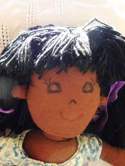 vintage brown cloth/rag doll very well made with painted face