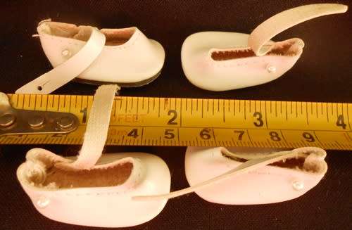 Shoes for small doll, White with tiny pearl button fastener length of sole on outside 3.5 cm 2 pairs