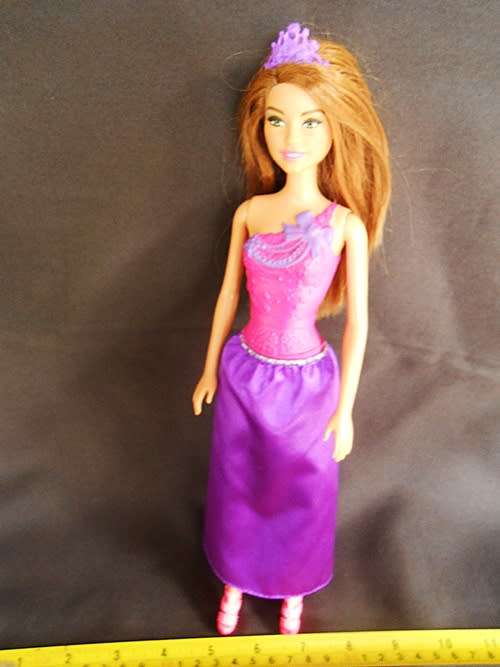 Barbie Princess Doll with brown hair and dress in fuchsia