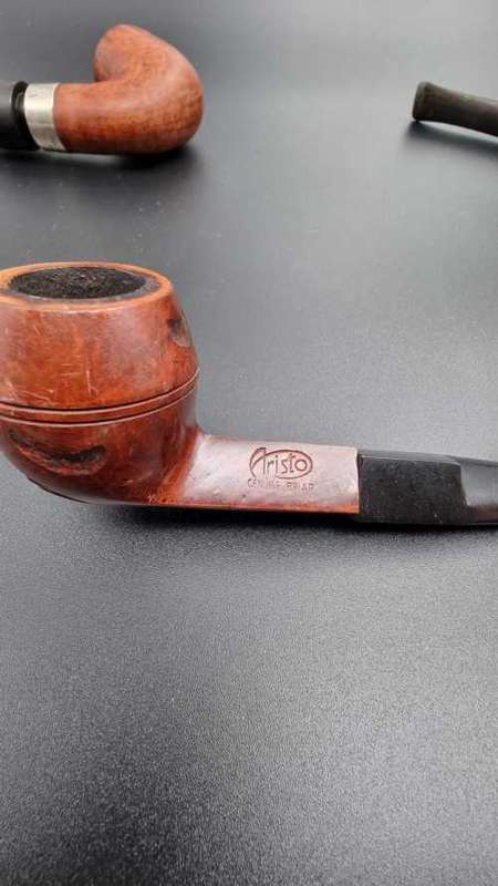 3 Wooden Smoking Pipes. One with Silver collar.