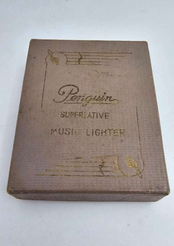 Vintage Penguin Music Lighter