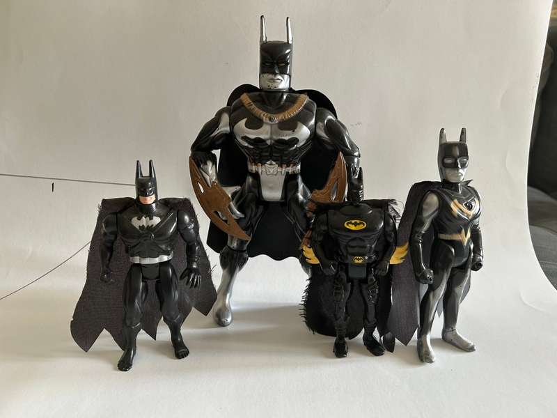 My collection of four Bootleg Knock off unlicensed BATMAN Figures from the 1990s