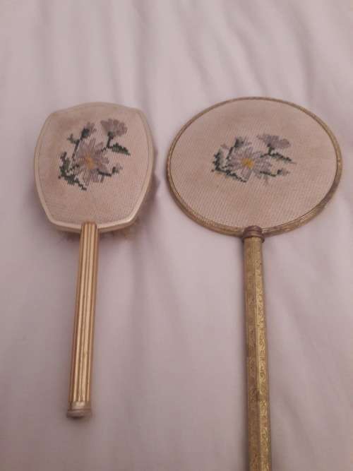 vintage hairbrush and hand mirror