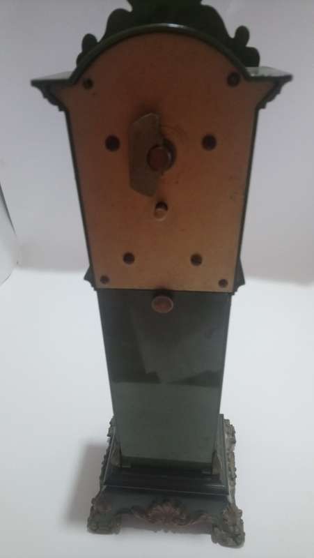 small grandfather clock pendulum
