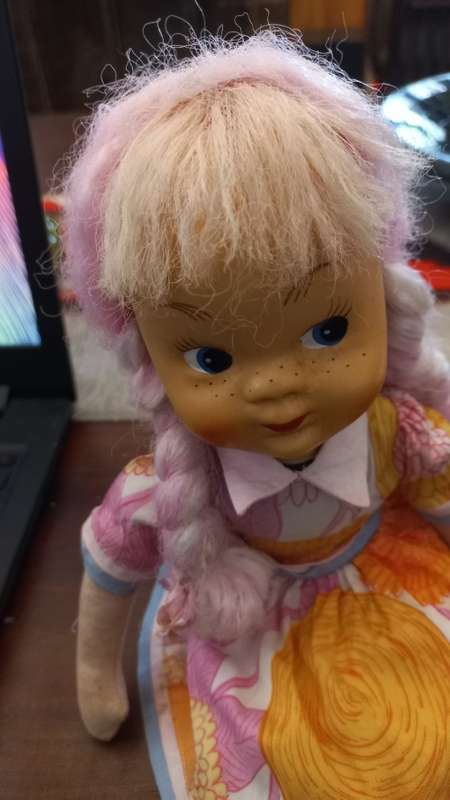 Vintage doll filled with sawdust