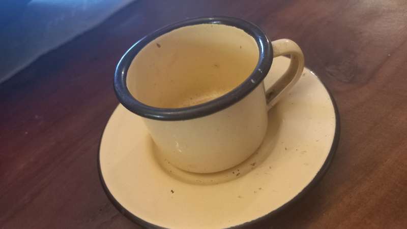 Enamel cup and saucer
