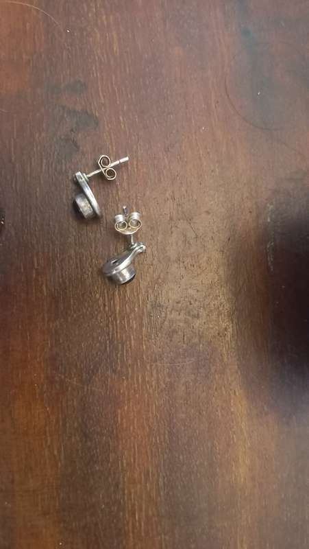 Sterling silver earrings with purple stone