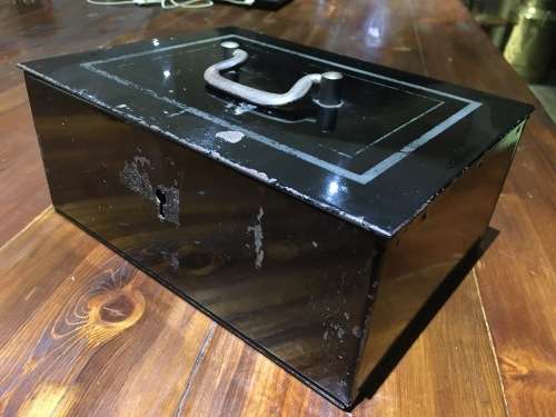 Old metal money box