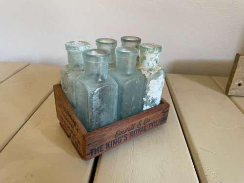 Old polish bottles in crate