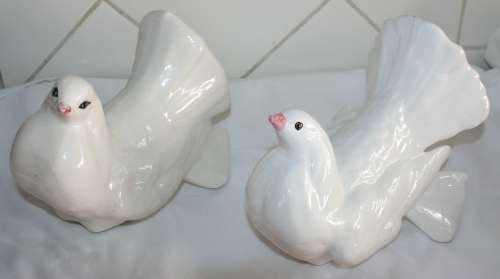 TWO MAGNIFICENT WHITE FAN TYLE PORCELAIN/CERAMIC DOVES