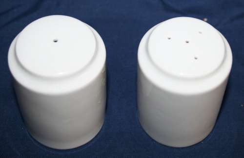 A EXQUISITE SET OF WOOLWORTH'S CRISP WHITE PORCELAIN SALT AND PEPER POTS