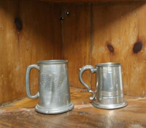 TWO STUNNING PEWTER? BEAR MUGS ONE WITH A GLASS BOTTOM