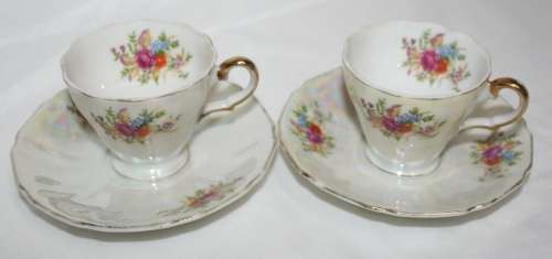 TWO EXQUISITE FINE PORCELAIN DEMASTE CUPS AND SAUCERS - STYLISH AND BEAUTIFUL