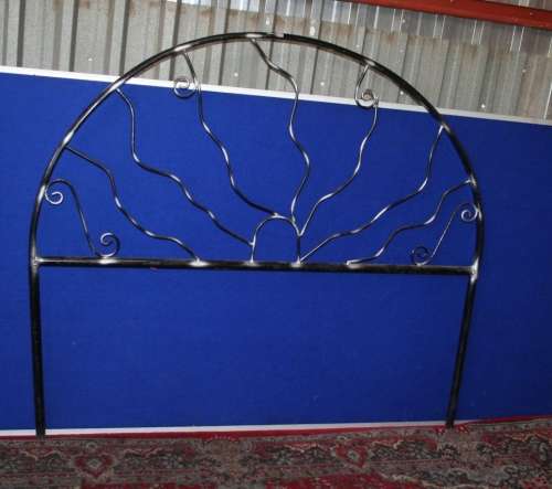 A INTERESTING DESIGNED METAL DOUBLE HEAD BOARD THAT YOU CAN FINISH IN YOUR OWN COLOR