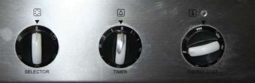 A BLACK DEFY SLIMLINE UNDERCOVER OVEN RELATIVELY NEW - IN GOOD CONDITION