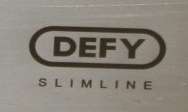 A BLACK DEFY SLIMLINE UNDERCOVER OVEN RELATIVELY NEW - IN GOOD CONDITION