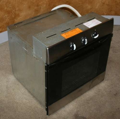 A BLACK DEFY SLIMLINE UNDERCOVER OVEN RELATIVELY NEW - IN GOOD CONDITION