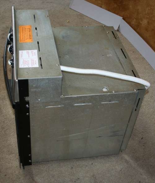 A BLACK DEFY SLIMLINE UNDERCOVER OVEN RELATIVELY NEW - IN GOOD CONDITION