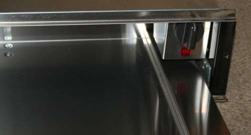 A WIHRLPOOL STAINLESS STEEL WARMER DRAWER LOOK LIKE BRAND NEW