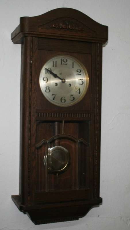 A Spectacular Mignon German Oak Case Striking Wall Clock in perfect working condition