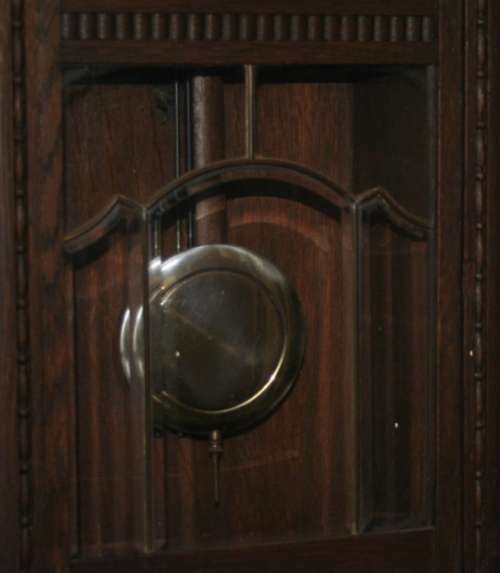 A Spectacular Mignon German Oak Case Striking Wall Clock in perfect working condition