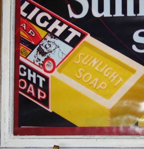 A MARVELOUS VINTAGE STYLE PRINT SUNLIGHT SOAP BEHIND GLASS IN A STUNNING WOODEN SHABBY CHIC FRAME