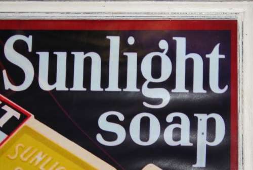 A MARVELOUS VINTAGE STYLE PRINT SUNLIGHT SOAP BEHIND GLASS IN A STUNNING WOODEN SHABBY CHIC FRAME