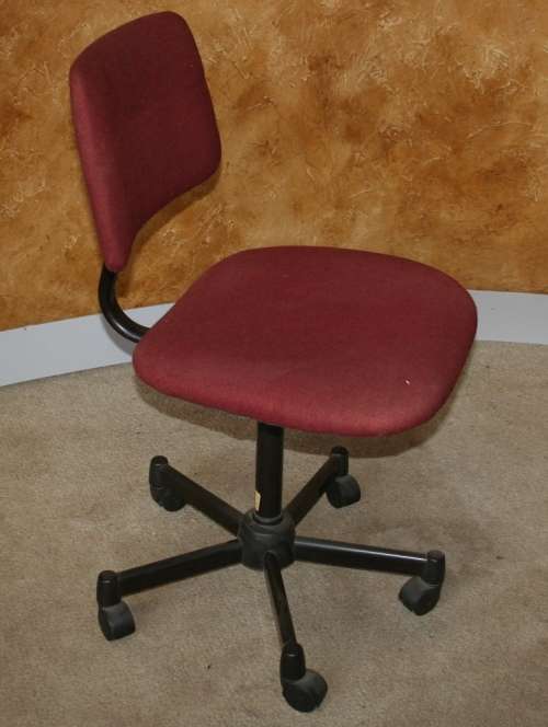 A MAROON TYPERS CHAIRS ON WHEELS LOOK BRAND NEW