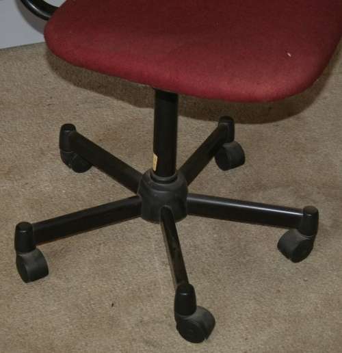 A MAROON TYPERS CHAIRS ON WHEELS LOOK BRAND NEW