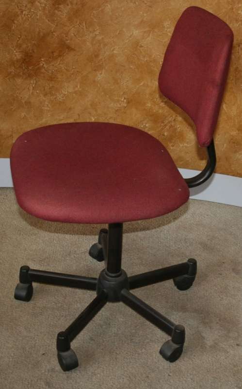 A MAROON TYPERS CHAIRS ON WHEELS LOOK BRAND NEW