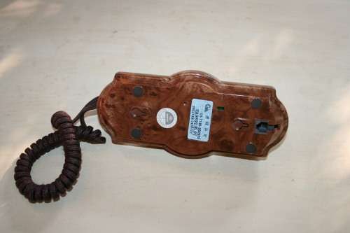 A GORGEOUS ANTIQUE LOOKING SYNTHETIC TELEPHONE IN WORKING CONDITION