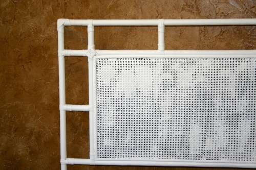 A STUNNING - CRISP WHITE DOUBLE CANE HEAD BOARD