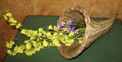 A STUNNING WICKER WEAVED FLOWER CONE - OR BEEN USED TO DISPLAY FRUIT